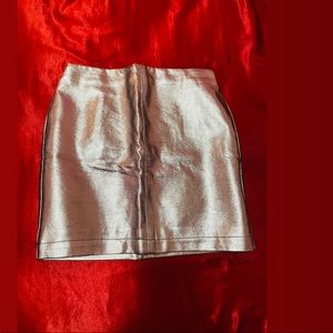 Limited edition silver mini skirt.